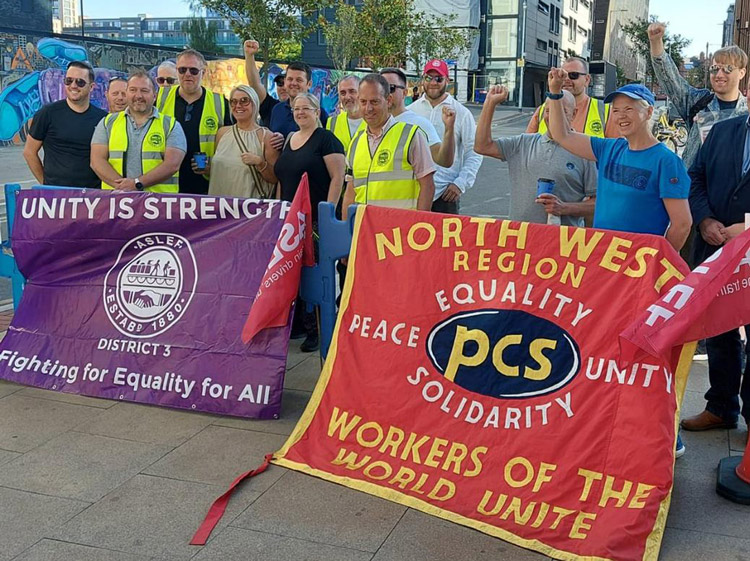 Public and Commercial Services unionists bring solidarity to picket of train drivers in Associated Society of Locomotive Engineers and Firemen during one-day walkout in Manchester Aug. 13.