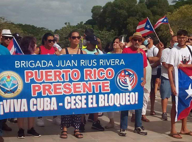 Cuba solidarity brigade from Puerto Rico holds banner in Camagüey, Cuba, July 3. In response to FBI harassment, group announced Sept. 17 protest in San Juan and 2023 brigade to Cuba.