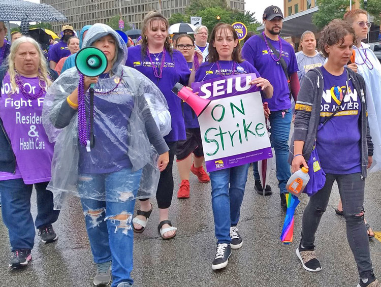 SEIU nursing home workers, who went on strike Sept. 2 at 14 sites in Pennsylvania, join Labor Day march in Pittsburgh. Right, striking health care workers at Kaiser in Northern California at Labor Day rally in Oakland.