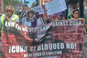 Marcha de Coalición Cuba Sí por barrio de Harlem en Nueva York exige fin total del embargo económico, financiero y comercial de los gobernantes estadounidenses contra Cuba, 28 de agosto.