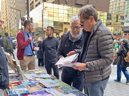 Militant/Eric Simpson Communist League table at Iran protest in Montreal Oct. 15 drew discussion over opposition to “morality police,” ending sanctions on Iran and Washington’s economic war on Cuba.