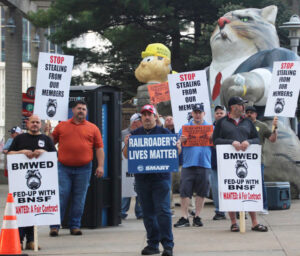 Rail track workers picket in Kansas City, Missouri, at North American Rail Shippers conference in May. The Brotherhood of Maintenance of Way Employees, which organizes 25,000 track workers, announced Oct. 10 its members voted down national agreement with rail bosses.