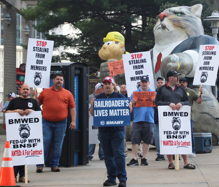Rail track workers picket in Kansas City, Missouri, at North American Rail Shippers conference in May. The Brotherhood of Maintenance of Way Employees, which organizes 25,000 track workers, announced Oct. 10 its members voted down national agreement with rail bosses.