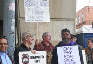 BMWE Lodge 0695 members win support for fight for paid sick days outside Oct. 23 Baltimore Ravens game. One woman going by responded, “Everyone deserves sick days, everyone!”