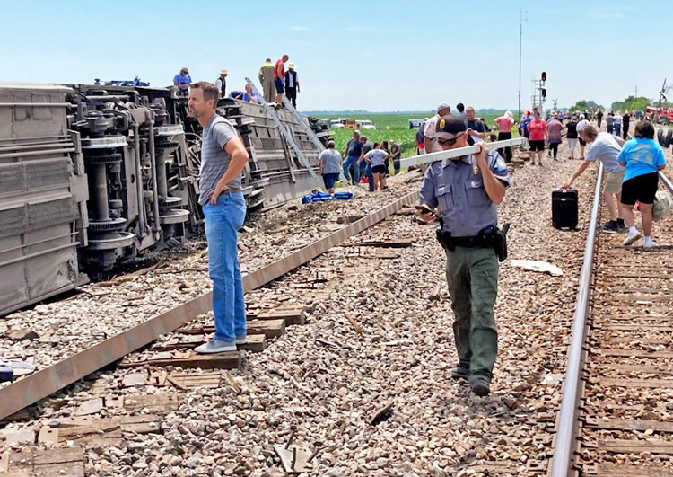 Amtrak train hit truck in Missouri June 27 with four killed. Bosses stalled on putting in warning signals there. Brotherhood of Railroad Signalmen voted down proposed contract Oct. 26.