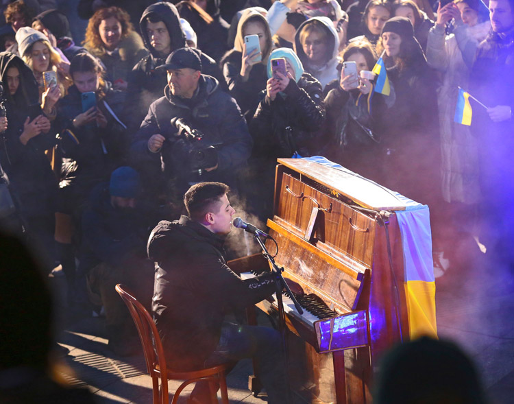 Oleg Shumei performs “Maidan” and other songs at Nov. 21 Maidan Reminiscences event in Lviv, Ukraine, on ninth anniversary of onset of popular uprising that overthrew pro-Moscow regime of Viktor Yanukovych. Dignity and Freedom Day was celebrated all across Ukraine.