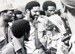 Fidel Castro said social program of Maurice Bishop, center, who led 1979-83 workers and farmers government in Grenada, “had support of the immense majority.” Counterrevolutionary coup in October 1983 led by Bernard Coard destroyed the revolution, led to US invasion.