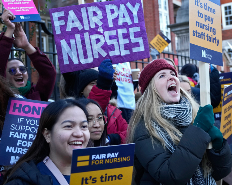 Nurses picket Royal Marsden Hospital in London Dec. 15, one of a series of nationwide work stoppages aimed at beating back low wages, effects of inflation and eroding work conditions.