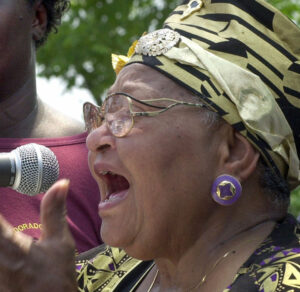 Mamie Till-Mobley speaks about the lynching of her son, Emmett, at rally in Kokomo, Mississippi, July 8, 2000.