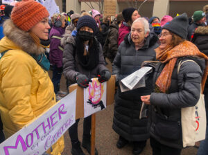 From left, nursing students Jessica Forsgren, Ashley Morgan discuss way forward with SWP Chicago mayor candidate Ilona Gersh and member Naomi Craine at Jan. 22 women’s rights rally in Madison, Wisconsin. SWP explains there is no “road to Black liberation or women’s emancipation separate and apart from working-class struggle to confront capitalism’s social crises.”