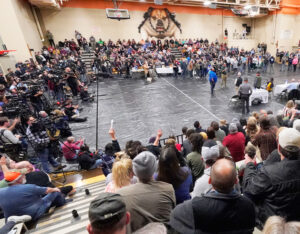 Town meeting of area residents at East Palestine High School, Ohio, Feb. 15, discussed Norfolk Southern derailment, fire and toxic chemicals released. Claiming they feared “outside agitators,” rail bosses backed out of meeting hours before it began. This made people madder.