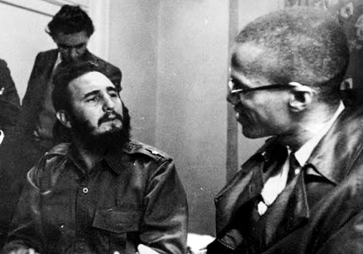 Malcolm X, right, meets with Fidel Castro at Hotel Theresa in Harlem, New York, Sept. 19, 1960. The Cuban Revolution “overturned the system” Malcolm explained in 1963.