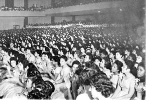 Graduation of 8,000 “Anitas,” December 1961 in Havana. Young peasant women each received a sewing machine, pledging to teach 10 others how to sew, and to spread the revolution.