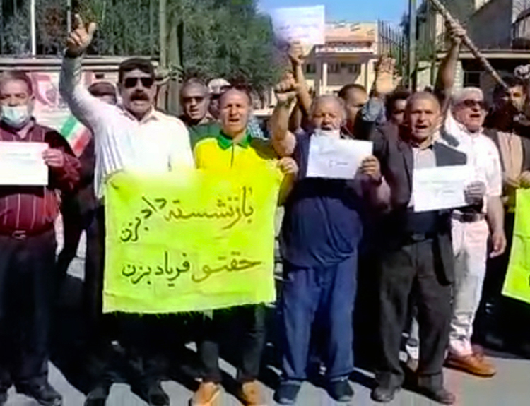 Retired workers and war veterans protest March 12 in Shush, Khuzestan province, Iran. For weeks protests have demanded hikes in social security, as soaring prices cut living standards.