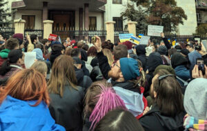 Russian emigres protest outside former Russian Embassy building in Tbilisi, Georgia, Feb. 24 on first anniversary of Moscow’s invasion of Ukraine. Placards included “No to war,” “12 months of Russian terror in Ukraine” and “Putin is not the motherland.”