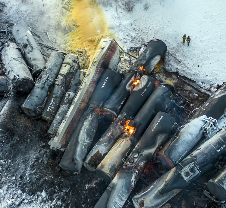 Pile of burnt cars on BNSF Railway train hauling highly flammable ethanol that derailed in Raymond, Minnesota, March 30. Over 800 people live there, many are tied to farming.