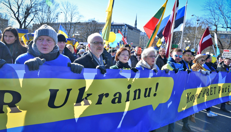 Latvians in Riga, March 5, 2022, say “We stand with Ukraine! Together against Putin!” shortly after Moscow’s invasion of Ukraine. Defending the right of national self-determination against “Russification” was integral part of 1917 Bolshevik revolution led by V.I. Lenin.