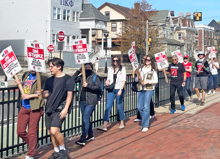Faculty and graduate student workers picket Rutgers University in New Brunswick, New Jersey, April 12. Five-day strike at three campuses statewide won wage raise for part-time teachers.