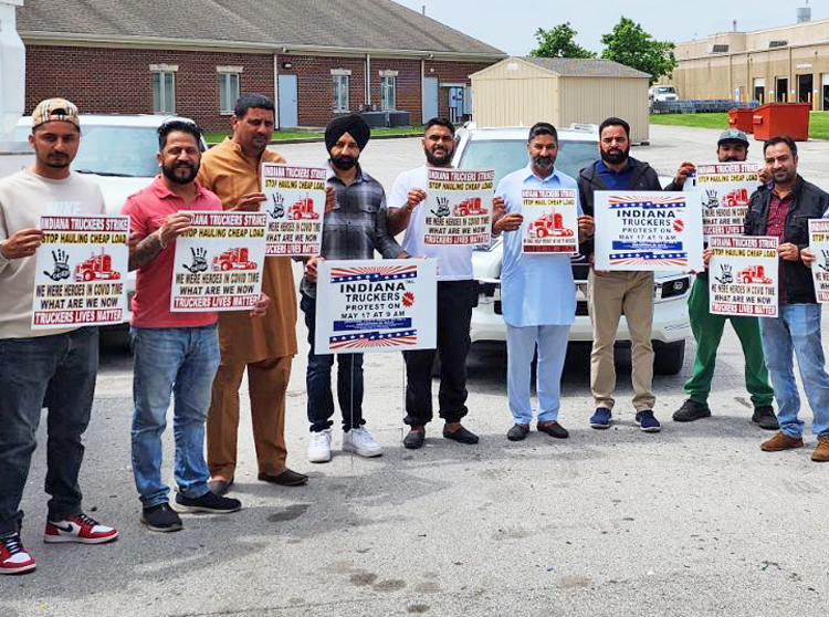 Hundreds of owner-operators, fleet drivers protested in Indianapolis May 17 against brokers slashing of freight rates. Punjabi drivers from India and Pakistan are 20% of all U.S. truckers.