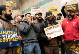 Teamsters rally at UPS depot in New York April 28, part of national fight for new contract to get rid of two-tier pay, boost wages for part-time workers and unify all the workers.