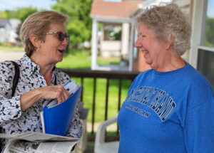 Rail worker and SWP member Candace Wagner, left, speaks with Nancy Felger, a retired health care worker and former SEIU shop steward, at her home in East Palestine, Ohio, May 25.