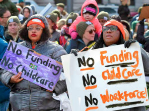 Union-led fight against capitalism’s erosion of ability of working people to start and provide for families is central to advancing women’s emancipation, said SWP National Secretary Jack Barnes. Above, March 8 child care protest in New Haven, Connecticut.