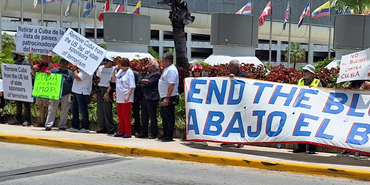 May 28 protest at Miami airport against U.S. rulers’ six-decades-long economic and political war on Cuba. Washington’s China “spy base” smears are used to justify tightening embargo.