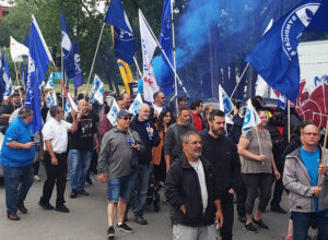 March in Montreal June 16 by supporters, United Steelworkers members on strike against Owens-Illinois plant there. Strikers are demanding a wage raise that keeps up with inflation.