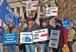 Rail workers rally at Columbus, Ohio, Statehouse Dec. 13, 2022. Unions fought for a contract with improved safety for themselves and communities near tracks. President Biden led bipartisan Congress to bar a strike after rail workers voted down bosses’ proposals.
