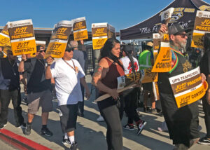 Teamsters at UPS warehouse in Riverside, California, join in July 6 “just practicing” picket and rally in preparation for potential strike when old contract for 340,000 workers expires July 31