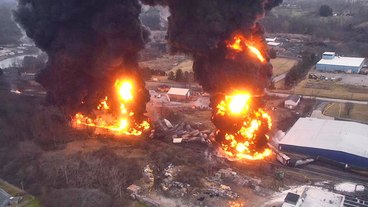 Uncontrolled toxic fire instigated by Norfolk Southern bosses after derailment in East Palestine, Ohio, six months ago prioritized getting trains running as opposed to safety of area residents.