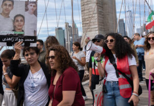 Sept. 16 protest in New York, above, and around world on anniversary of death of young Kurdish woman Zhina Amini. She died in Tehran after arrest by Iran’s hated “morality police.” Demands included end to counterrevolutionary regime’s repression, release of all political prisoners.