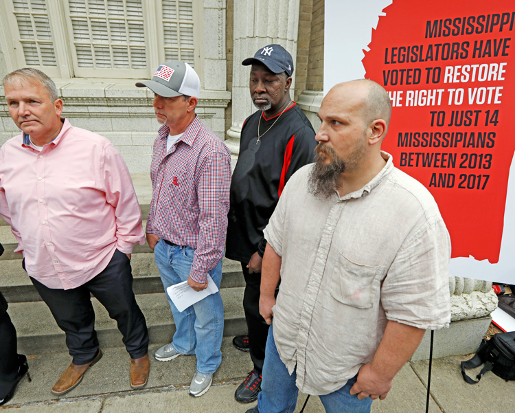Federal judges in Mississippi ruled 2-1 Aug. 4 to restore voting rights for former felons. Above, from left, former prisoners Wayne Kuhn, Dennis Hopkins, Byron Coleman and Jon O’Neal at press conference in Jackson, Mississippi, in 2018, demanding their right to vote.