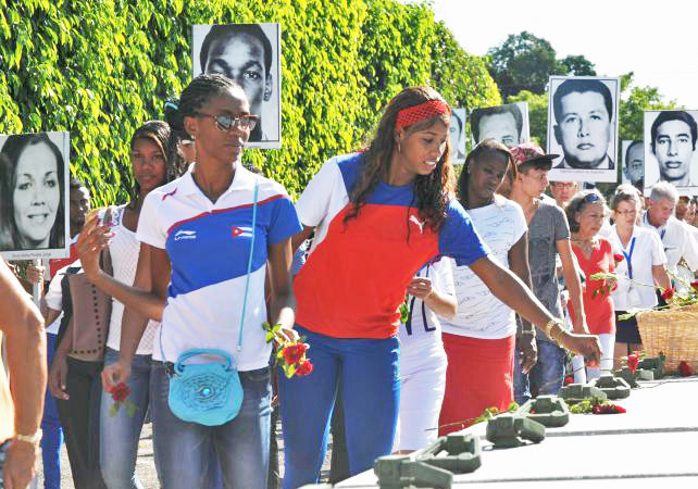 At Colón Cemetery in Havana, Oct. 6, 2015, Cubans mark 39th anniversary of destruction of Cubana Flight 455, blown up by opponents of Cuba’s socialist revolution, killing 73 people.