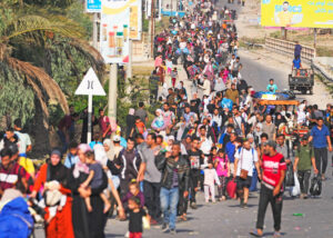 Palestinians flee south from Gaza City Nov. 8. To minimize casualties, Israeli forces opened a corridor and encouraged Gazans to evacuate before conducting further military operations against Hamas, which uses civilians as human shields to protect its fighters and weaponry.