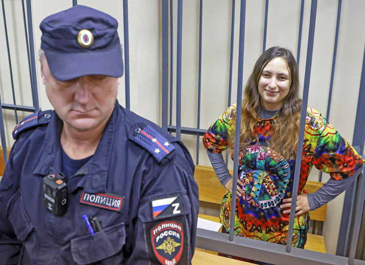 Alexandra Skochilenko, antiwar artist, at court hearing in St. Petersburg, Russia, Nov. 14. She faces eight years in prison on charges of spreading “false information” about Russian army by putting stickers over supermarket price tags with facts on Moscow’s brutal invasion of Ukraine.