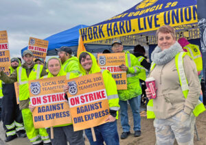 Teamsters members picket at DHL Express in Hebron, Kentucky, Dec. 9. More than 1,100 newly organized workers at DHL’s main U.S. hub struck Dec. 7 over safety, wages, dignity.