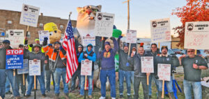 Rail workers rally outside Indiana Harbor Belt railroad office in Hammond, Indiana, Nov. 15 to demand bosses agree to provide paid sick leave.