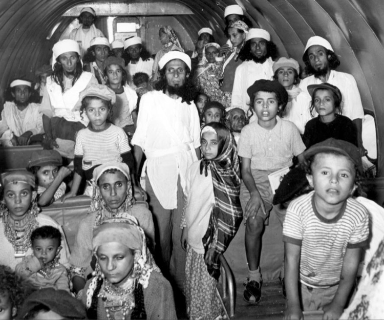 Yemeni Jews arrive at Lod Airport in 1950 after fleeing Yemen due to anti-Jewish persecution.
