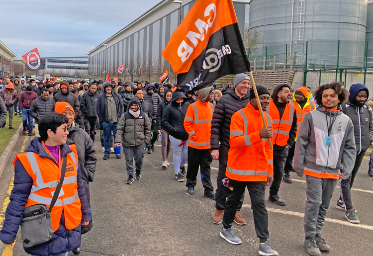 Striking workers march in fight for union at Amazon warehouse in Coventry, England, Feb. 13.