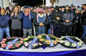 Arabs, Jews attend funeral for Ahmad Abu Latif, Bedouin soldier in Israeli army, who died fighting Hamas in Gaza. “Jews, Arabs must work together,” his brother said. “We’re threatened by a common enemy.”