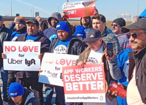 Uber, Lyft and DoorDash workers rally in Chicago Feb. 14. First nationwide strike by app drivers in U.S. was joined by drivers in Toronto, Vancouver and Winnipeg in Canada.