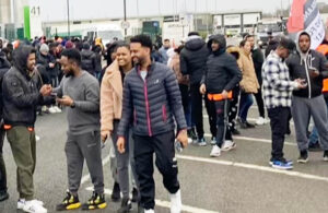 Workers rally at Amazon warehouse in Coventry, England, March 19, part of two-day strike to win union recognition. “Our fight has worldwide importance,” said Darren Westwood.