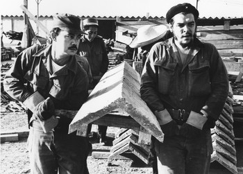 Che Guevara, right, in voluntary labor at 1961 Cuban construction site. In 1987, Fidel Castro led revival of Che’s ideas on transforming working people while deepening socialist revolution