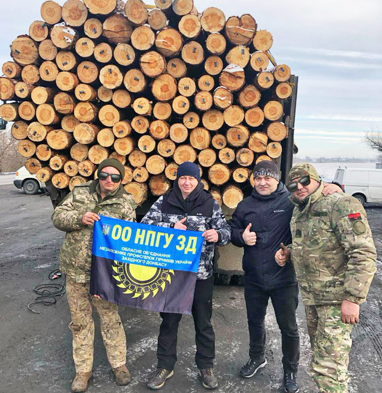 Workers from the Independent Trade Union of Miners of Ukraine deliver wood, other supplies to soldiers on the frontline in war to defeat Moscow’s invasion, defend Ukraine independence.