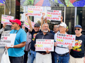 Taxi drivers protest outside hearing on imposing onerous “congestion pricing” tolls in New York. Plans like this tax working people, while wealthy bondholders rake in the profits.