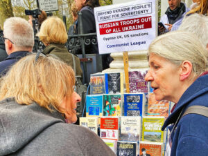 Pamela Holmes, right, Communist League parliamentary candidate for Tottenham, campaigns at March 17 protest by Russians in London against Vladimir Putin, his invasion of Ukraine.