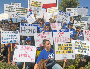 Striking nurses picket at Santa Clara County hospital in Gilroy, California, April 3. They are protesting bosses’ failure to take steps to eliminate understaffing that impacts care for patients.