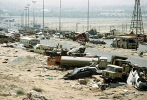 Road from Kuwait to Basra, Iraq, where U.S. bombs and shelling slaughtered thousands of retreating Iraqi soldiers and civilians, February 1991. So long as dictatorship of capital remains — based on class exploitation and capitalist control of production and exchange — there is no solution to imperialism’s march toward fascism and war.