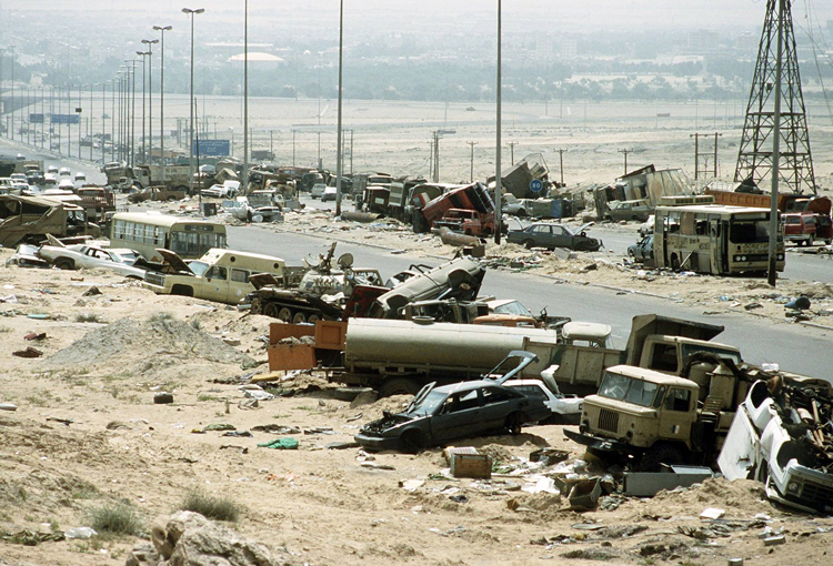 Road from Kuwait to Basra, Iraq, where U.S. bombs and shelling slaughtered thousands of retreating Iraqi soldiers and civilians, February 1991. So long as dictatorship of capital remains — based on class exploitation and capitalist control of production and exchange — there is no solution to imperialism’s march toward fascism and war. 